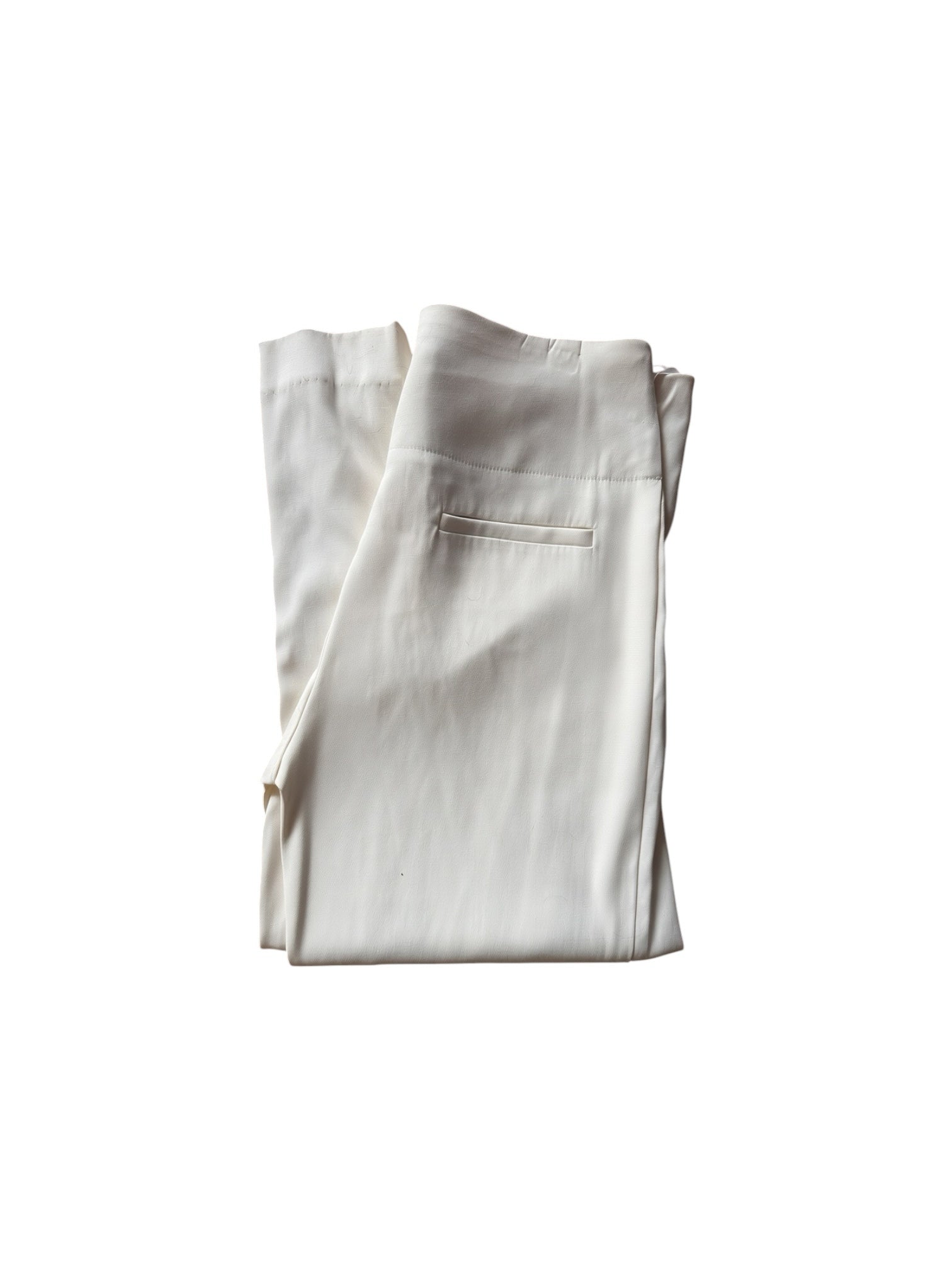 The Renewal Edit cream high-waisted tailored trousers with a slim leg and back pocket detail on a white background.